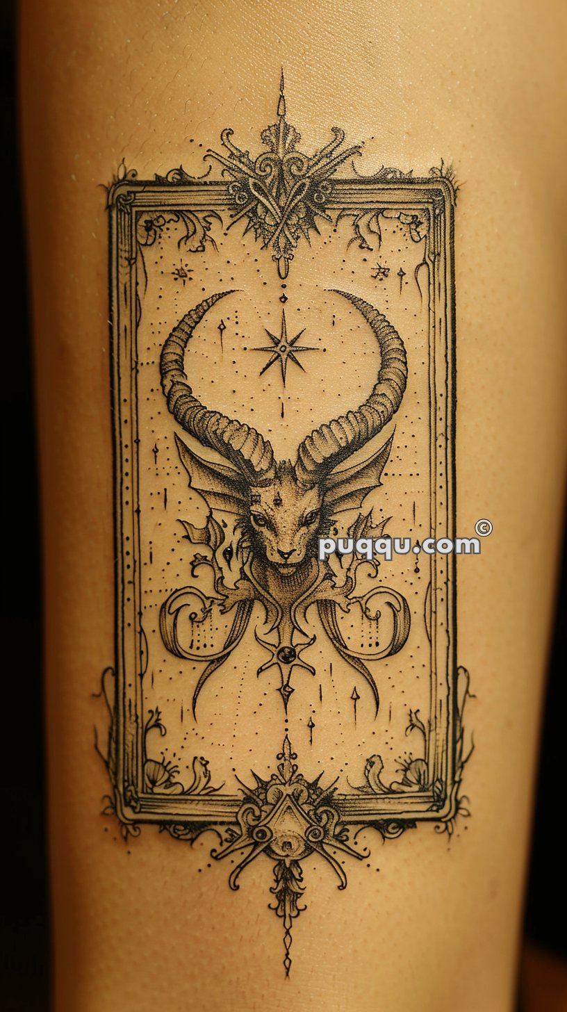 Intricate tattoo of a goat skull with long, curved horns enclosed within an ornate rectangular frame, featuring delicate decorative elements and a star above the skull.