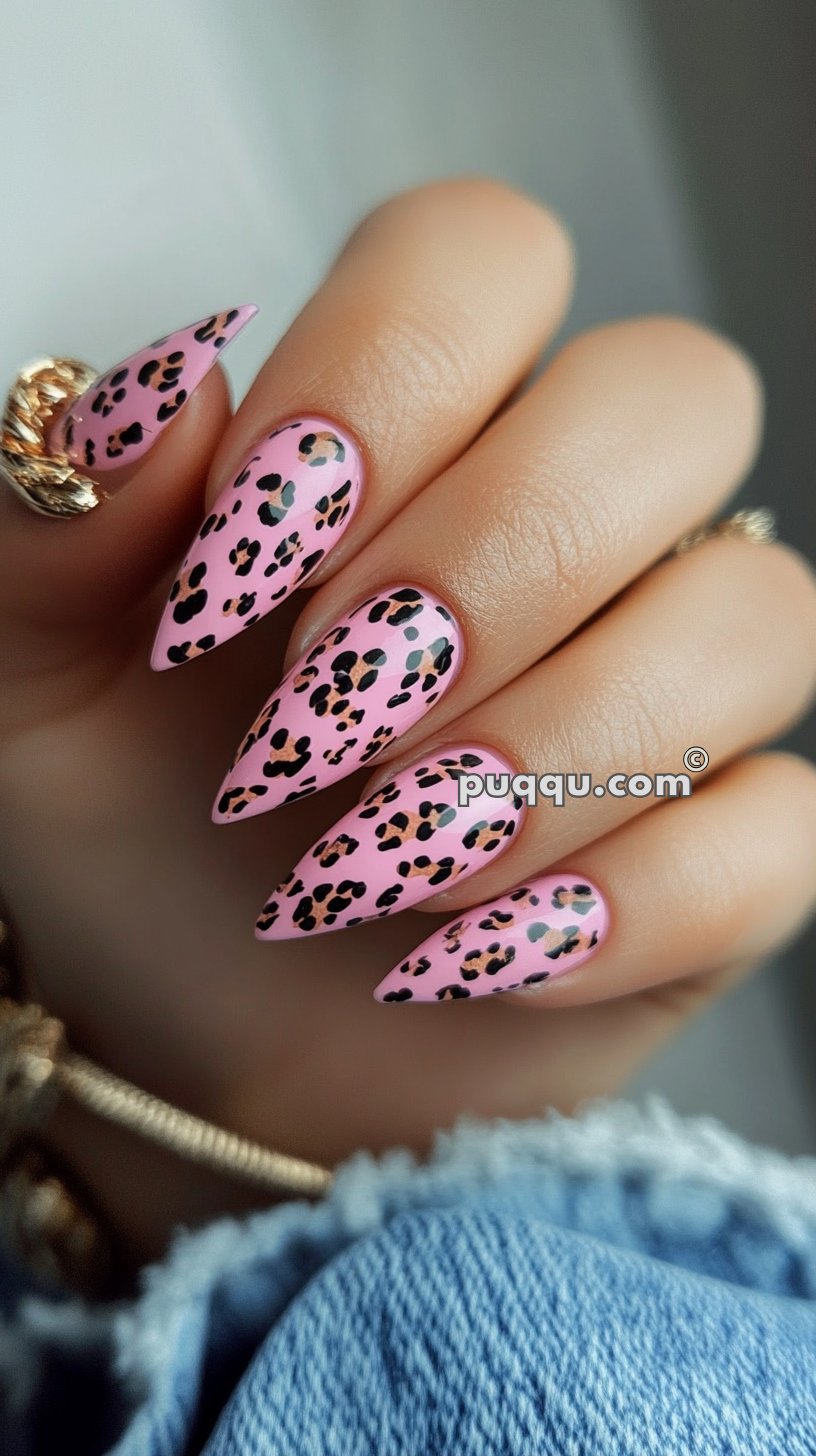 Pink leopard print stiletto nails.