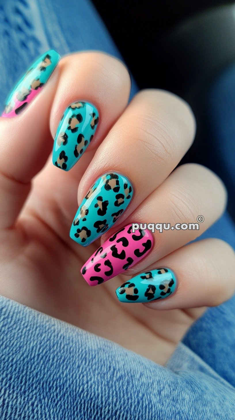 Turquoise and pink nails with black leopard print design.