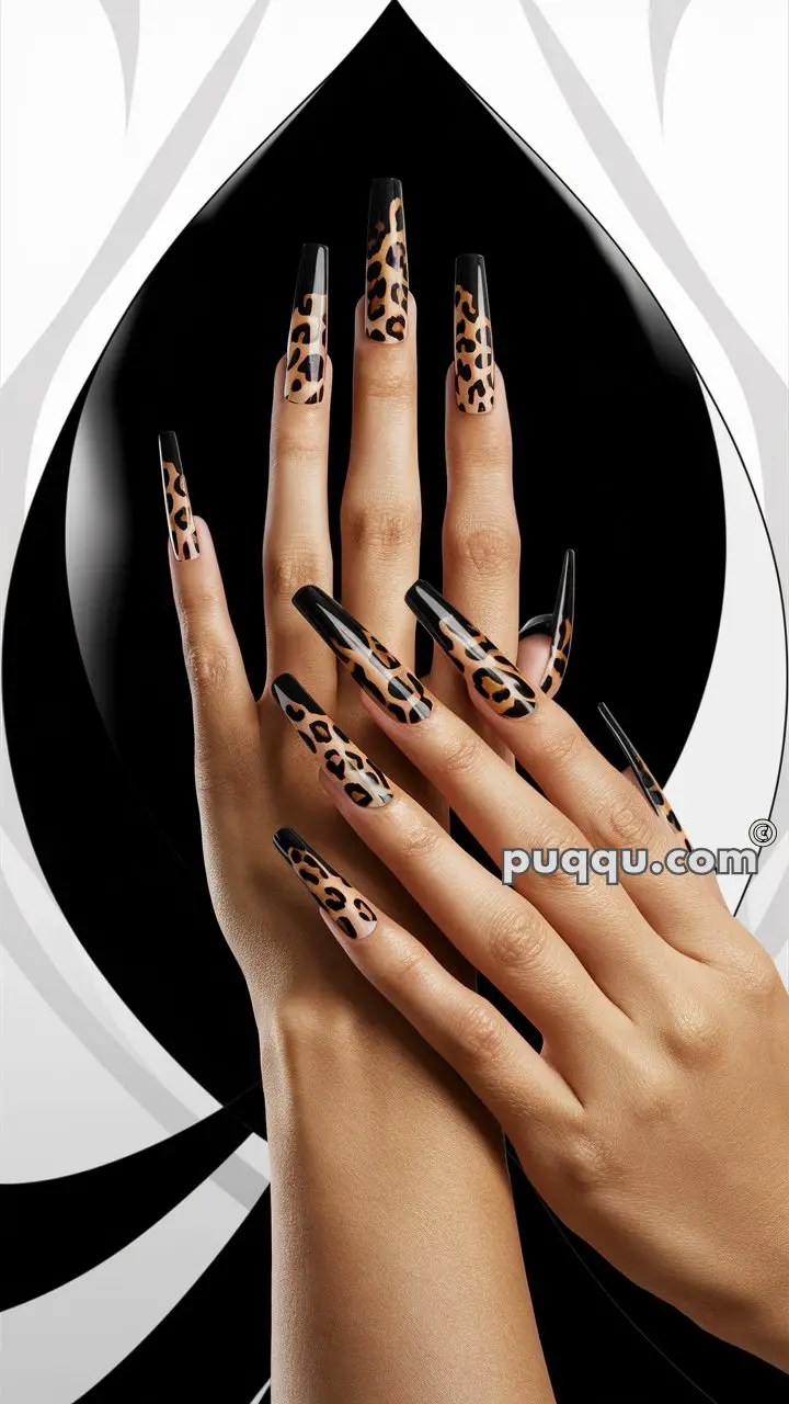 Hands with long, square-shaped nails featuring a black and leopard print design, against a black and white abstract background.