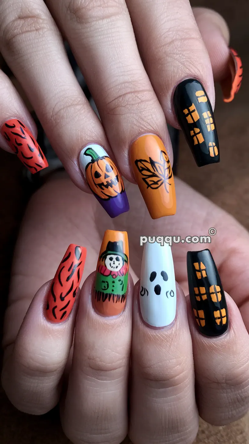 Hands with long Halloween-themed nail art designs including pumpkins, ghosts, haunted houses, scarecrows, and fall leaves.