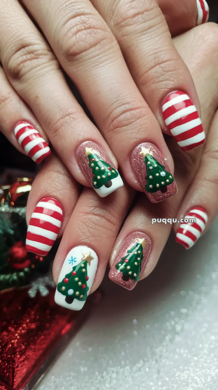 Christmas-themed nail art with red and white stripes and green Christmas tree designs on glittery and white backgrounds.