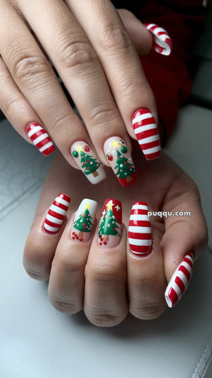 Festive nail art featuring red and white stripes and Christmas tree designs with decorations.