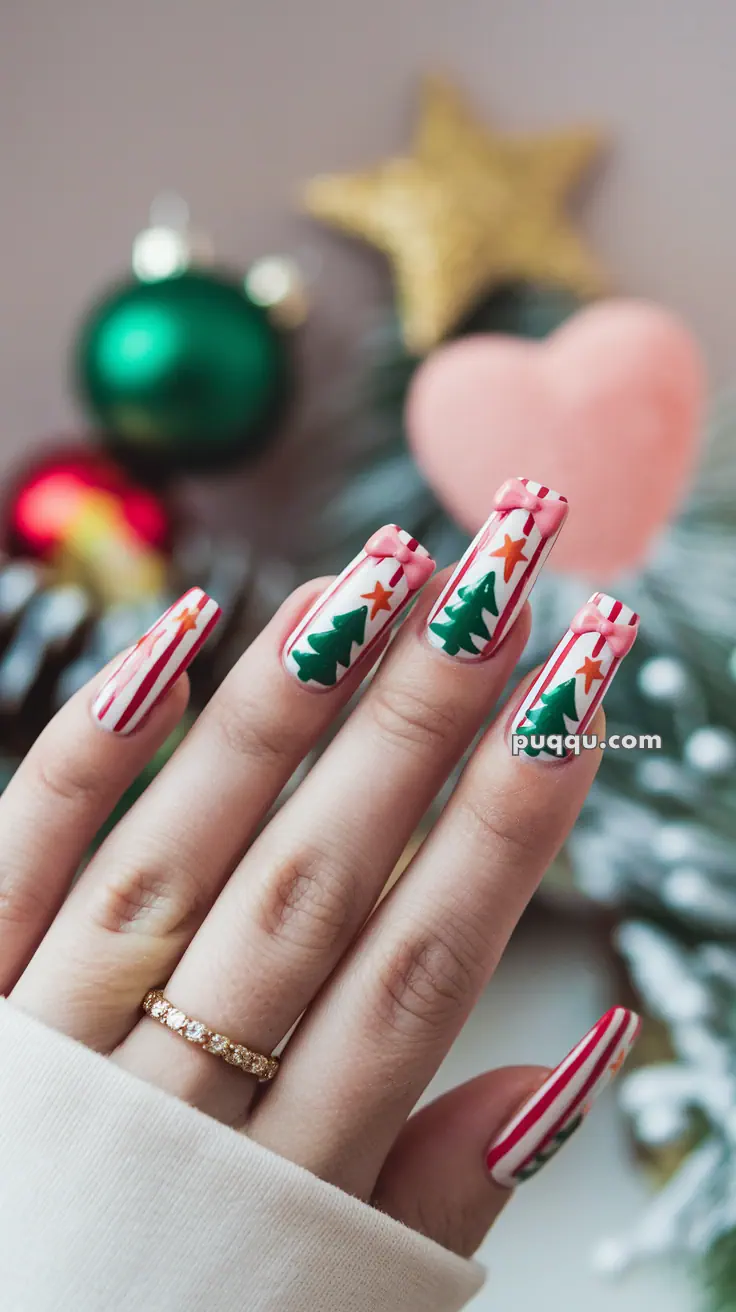 Festive Christmas-themed nail art with tree and star designs, featuring red and white stripes.