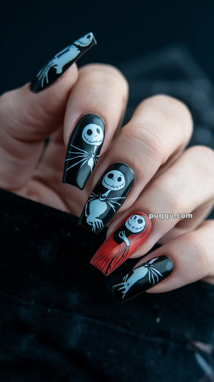 Halloween-themed nail art featuring a skeleton design on long nails with black, white, and red colors.