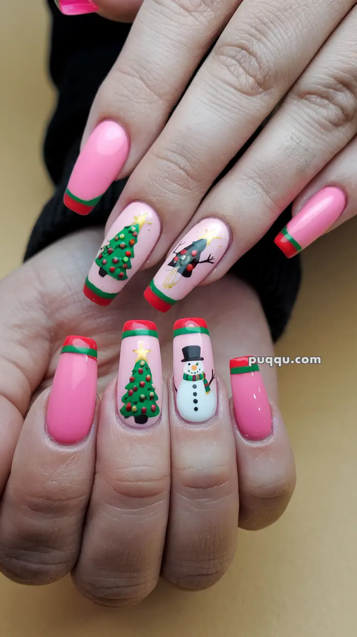 Nails with festive Christmas designs, including Christmas trees and a snowman, on a pink and green background.