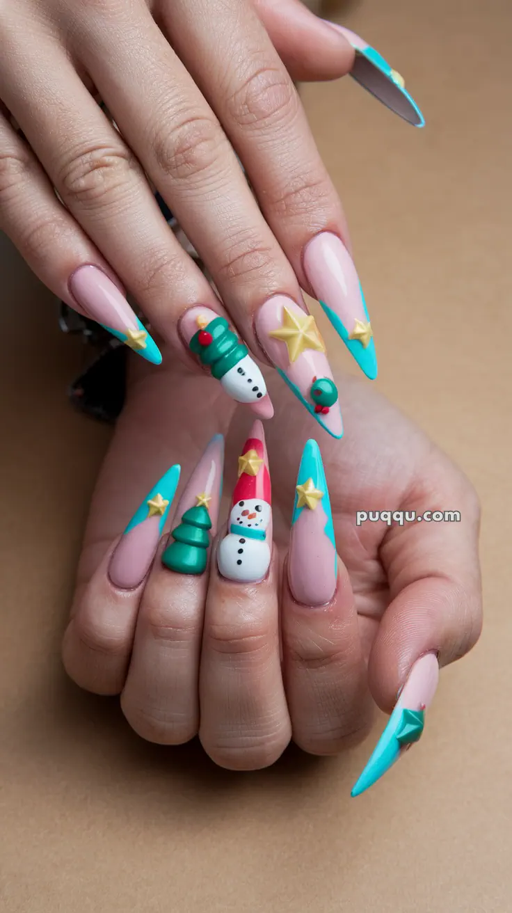 Hands with elongated, decorated nails featuring festive 3D designs like snowmen, stars, and Christmas trees.