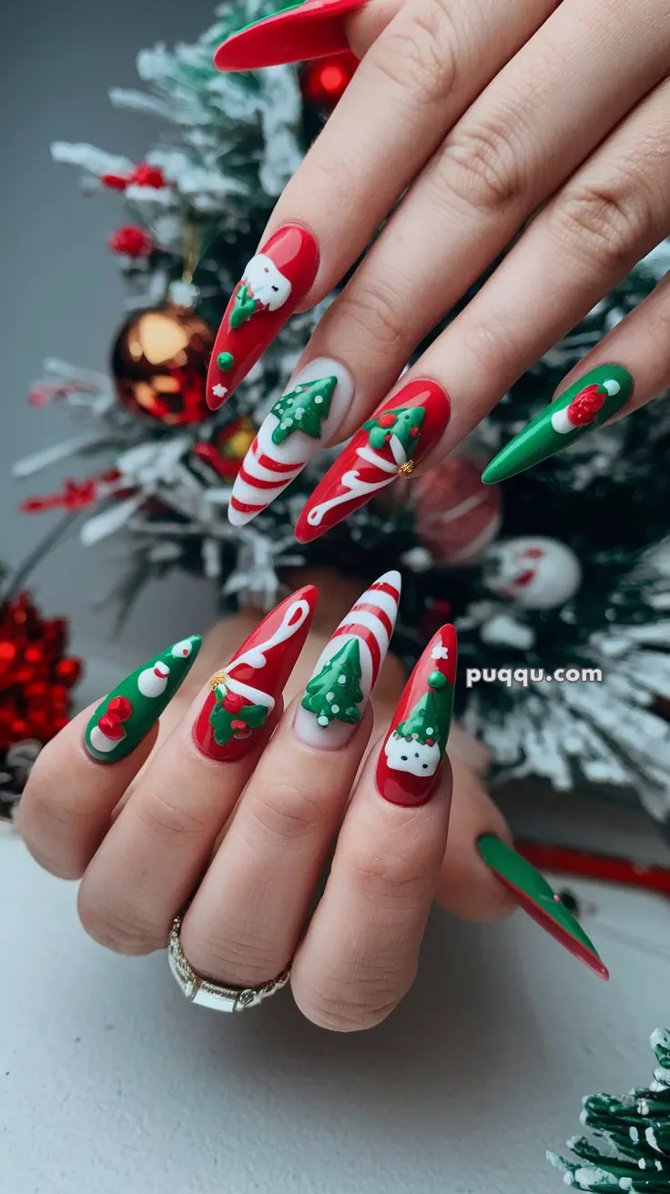 Christmas-themed nail art with 3D decorations featuring Santa, Christmas trees, and candy canes.