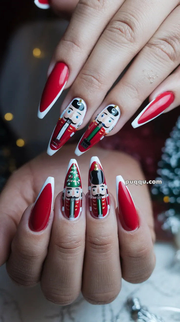 Red and white nails with nutcracker designs.