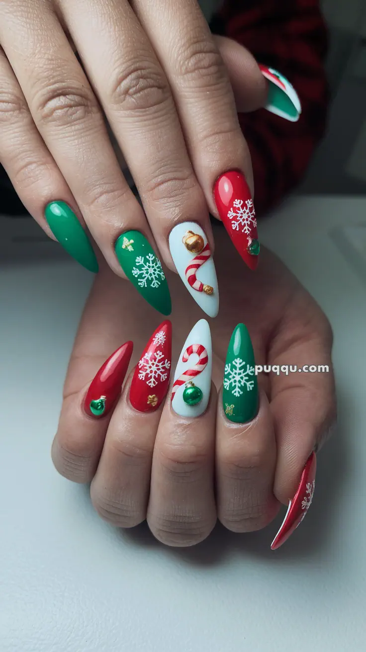 Festive red, green, and white nails with Christmas-themed designs including snowflakes, bells, and candy canes.