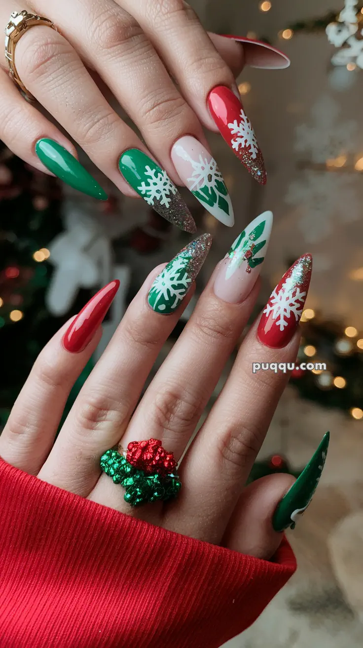 Festive holiday-themed nail art with red, green, and glittery designs featuring snowflakes and Christmas patterns.