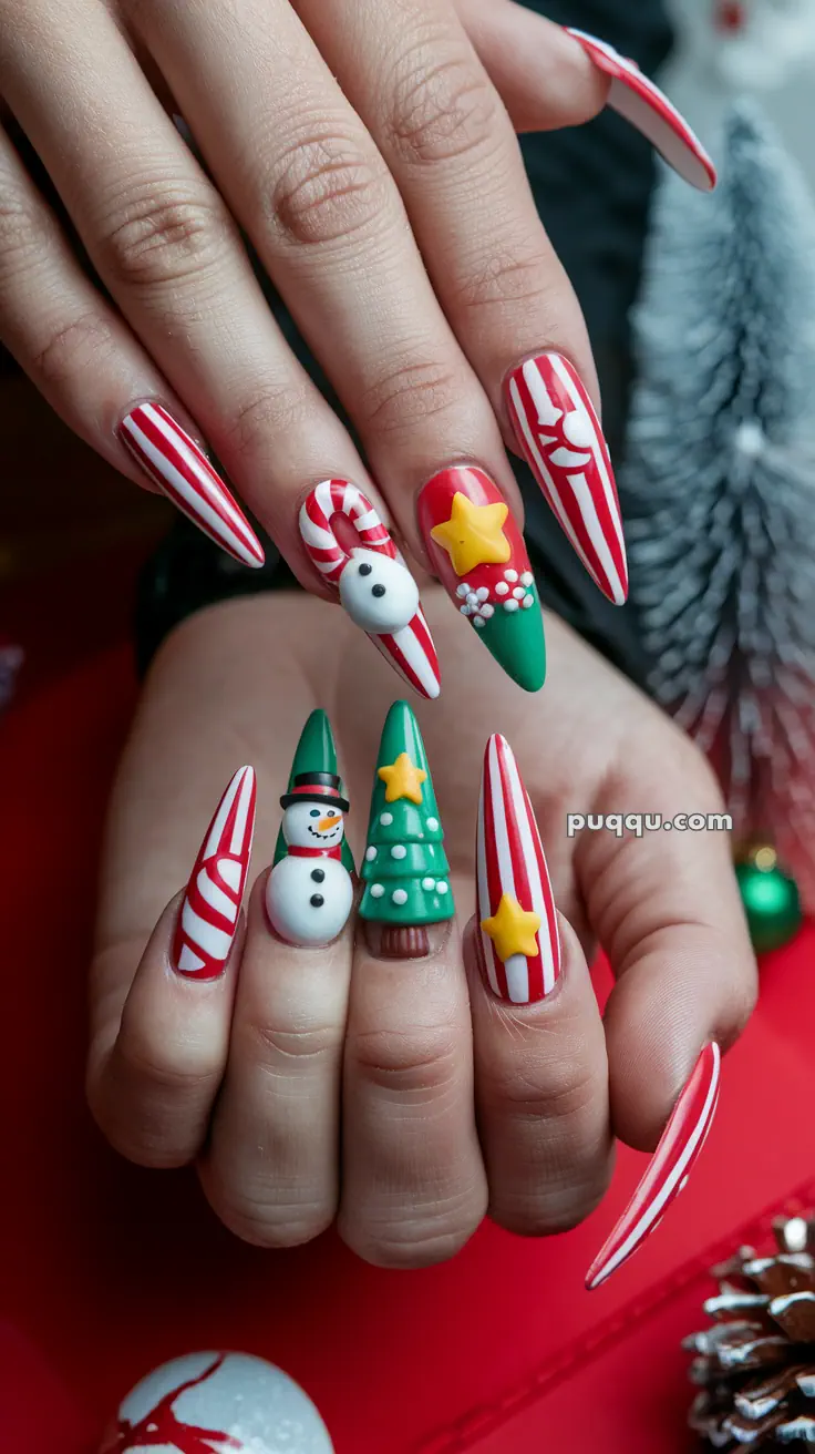 Festive Christmas-themed manicure with 3D designs, including candy cane stripes, a snowman, and a decorated Christmas tree.