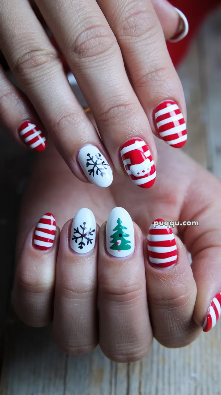 Festive nail art featuring red and white stripes, black snowflakes, a green Christmas tree, and a Santa design.