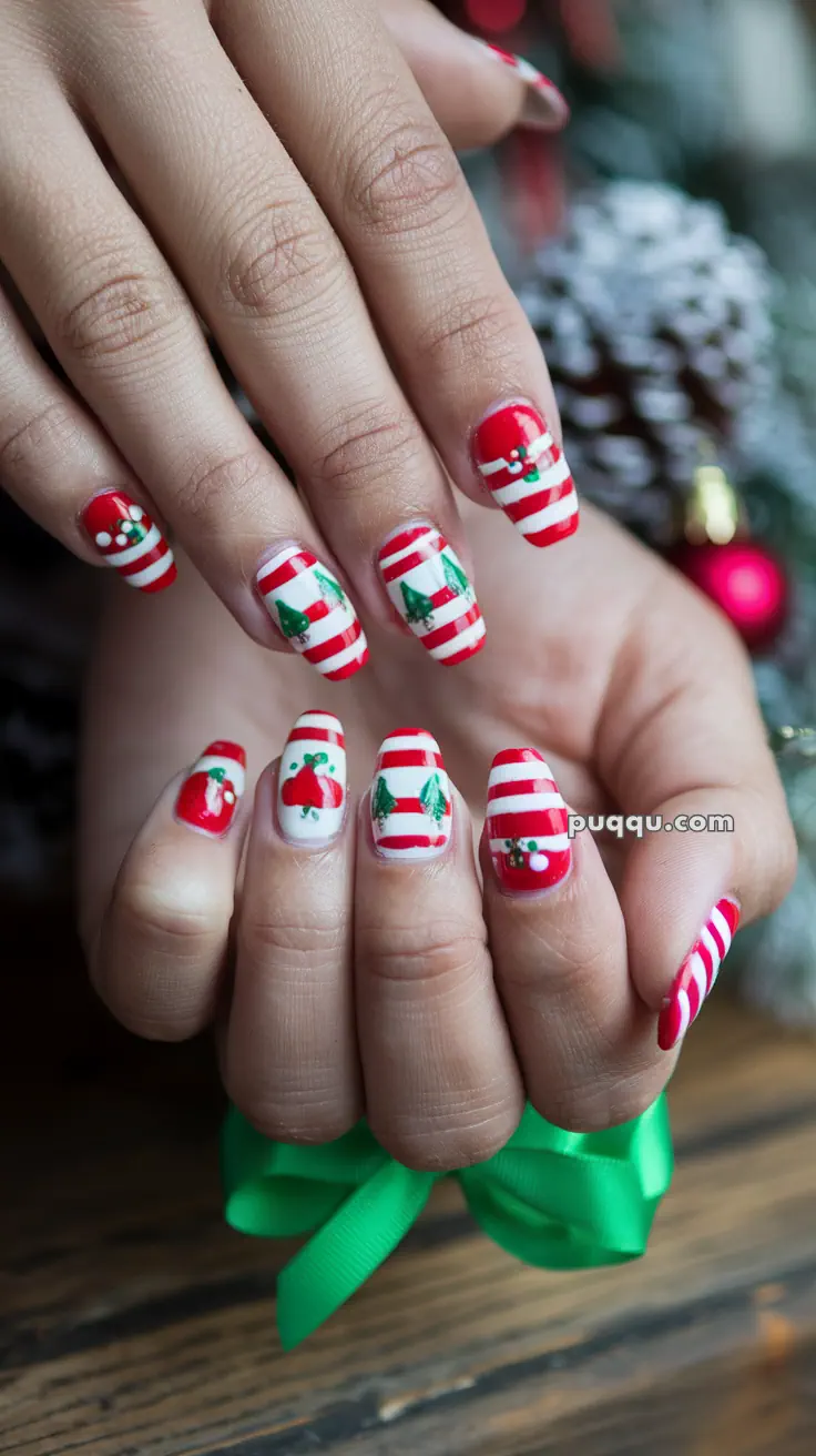 Christmas-themed nail art with red and white stripes, holly, and Christmas tree designs.