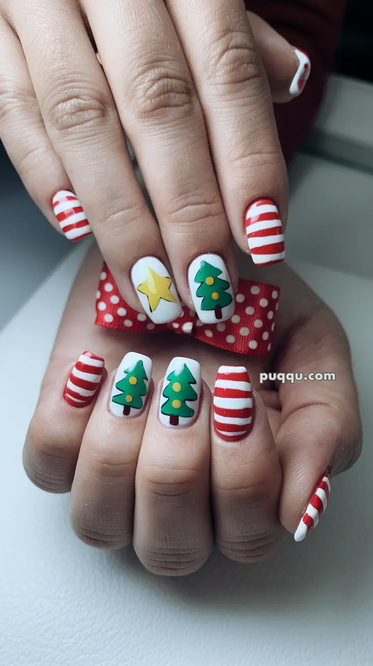 Nails with red and white stripes, Christmas trees, and a yellow star design.