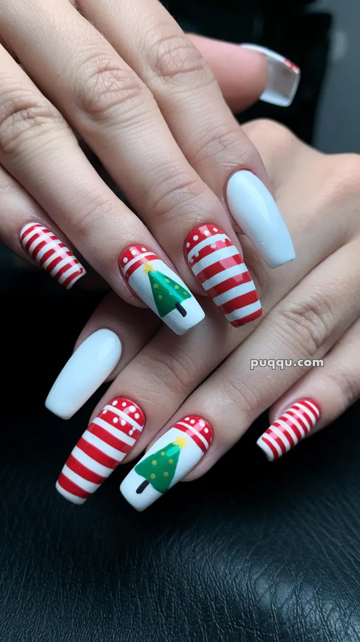 Nails with red and white stripes, polka dots, and Christmas tree designs.