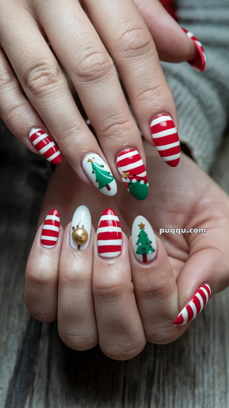 Hands showing Christmas-themed nail art with red and white stripes, Christmas trees, and ornaments.