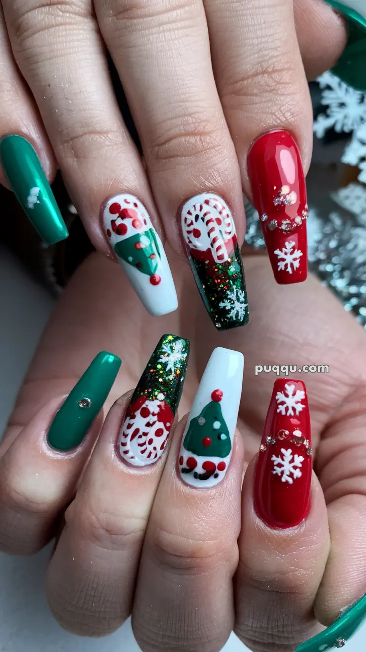 Festive Christmas-themed fingernail art with red, green, and white colors, featuring holiday decorations like snowflakes, Christmas trees, and candy canes.