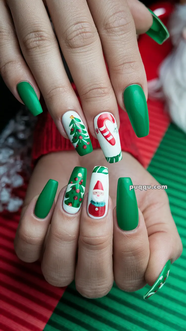 Festive nail design with green base and Christmas-themed art including a tree, candy cane, and Santa Claus.