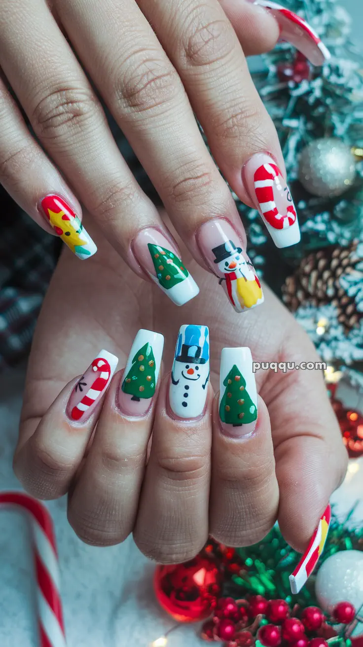 Festive Christmas-themed nail art featuring snowmen, Christmas trees, and candy canes.