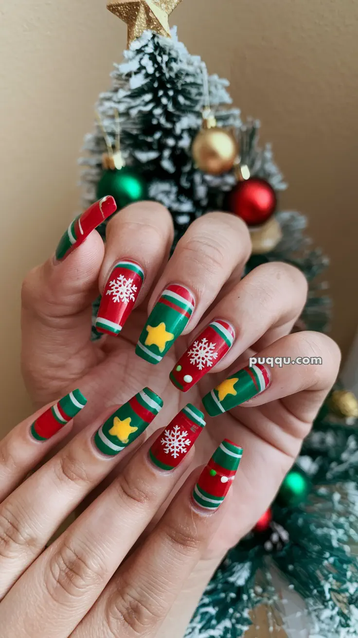 Festive Christmas-themed nail art featuring red, green, and gold designs with snowflakes, stars, and stripes.