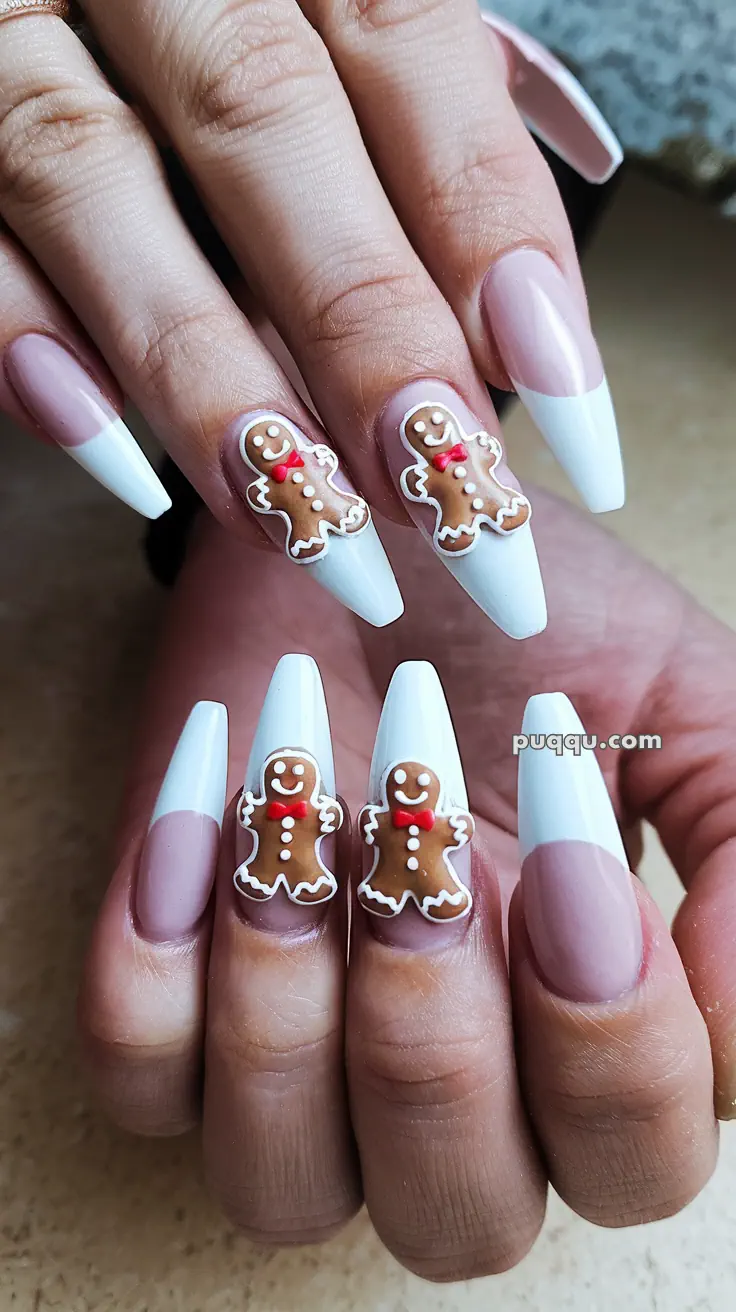 Fingernails with white tips and gingerbread man nail art designs.