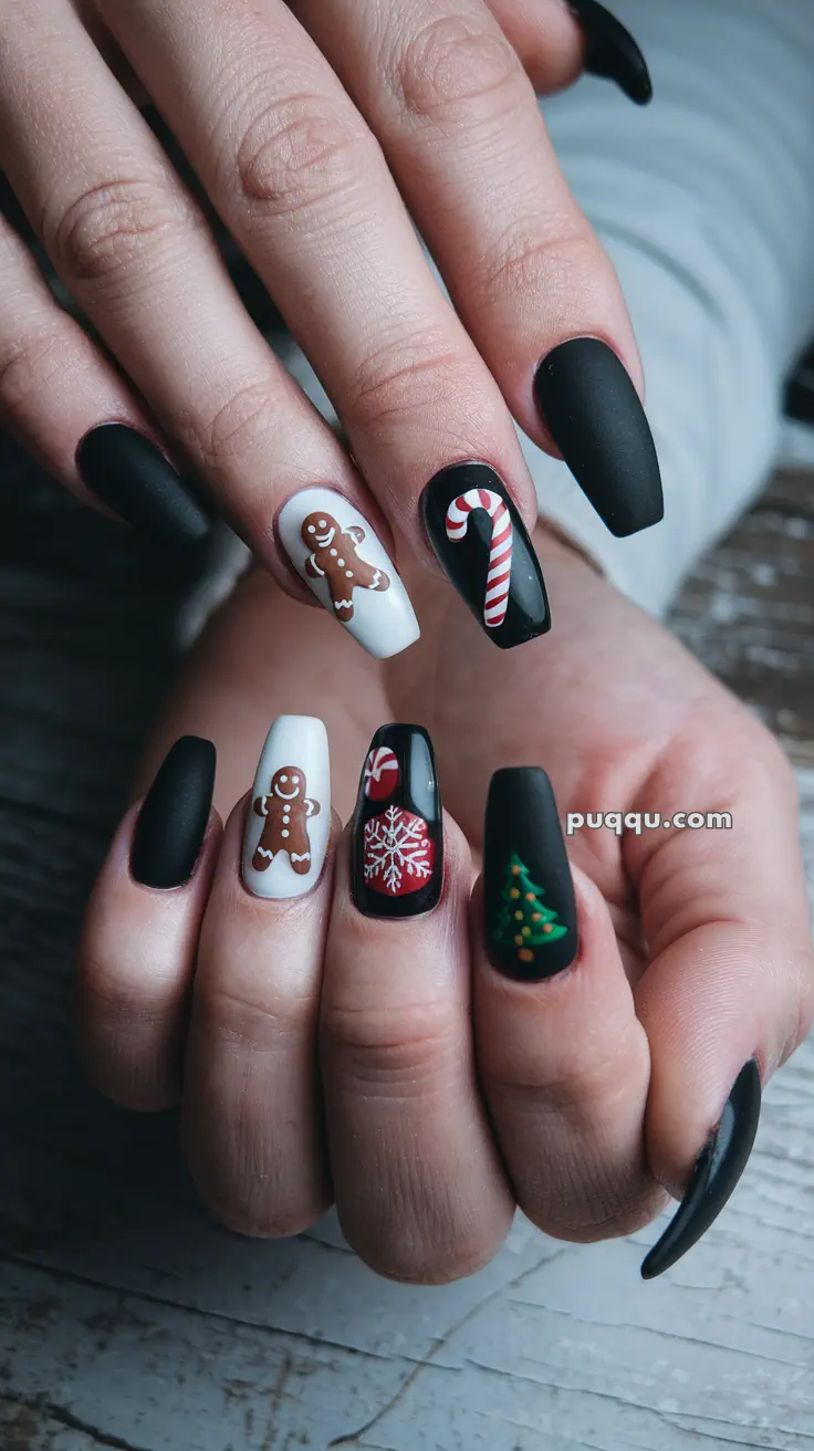 Black and white Christmas-themed nail art featuring gingerbread men, candy canes, snowflakes, and a Christmas tree.