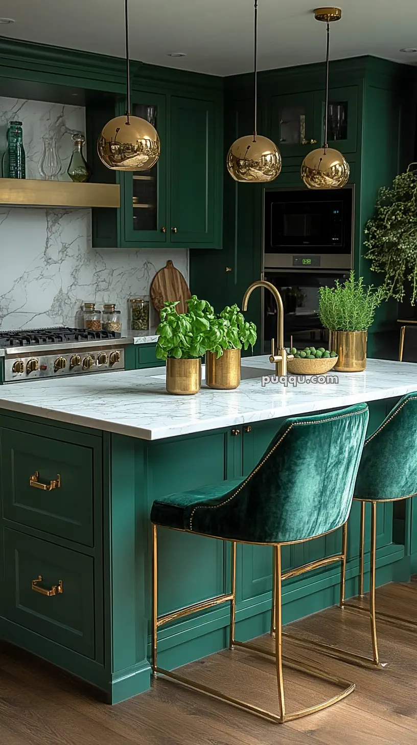 Green kitchen with marble countertops, gold accents, and green velvet bar stools.