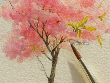 A watercolor painting of a cherry blossom tree with pink blooms, set against a light background, with a fine artist's paintbrush resting on the paper.