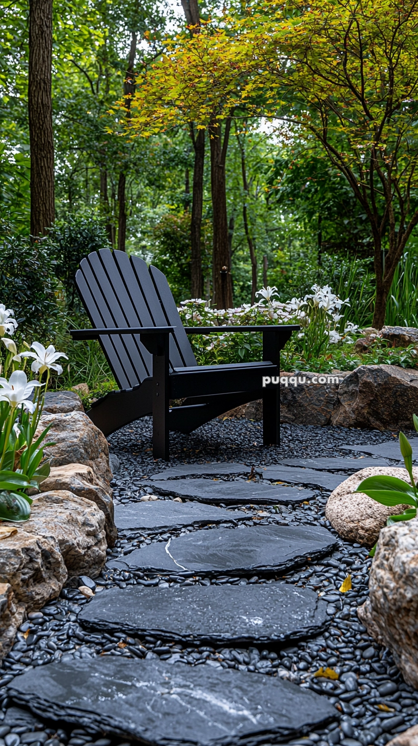A serene garden setting featuring a black Adirondack chair on a slate stepping stone path, surrounded by white flowers and lush greenery.