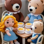 Crocheted dolls of three bears and a girl with blonde hair around a table set with bowls.