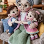 A crocheted doll of an elderly woman with glasses sitting on a couch, holding hands with two children dolls dressed in colorful outfits, set in a cozy living room with plants and a patterned rug.