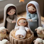 Crocheted nativity scene featuring a baby in a manger surrounded by figures representing Mary and Joseph, with several sheep figures around them.
