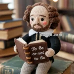 A crocheted doll of a historical figure with curly hair and a goatee, dressed in period clothing, holding an open book with the words "To be or not to be" while seated on a stack of books in a library setting.