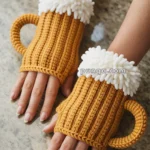 Hands wearing knitted mittens shaped like beer mugs with foam design on top.