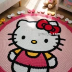 A pink round rug featuring a cartoon cat character with a red bow, placed on a wooden floor in a child's room setting, surrounded by plush toys.